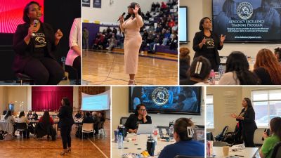 Women speaking and presenting at a professional event with attendees.
