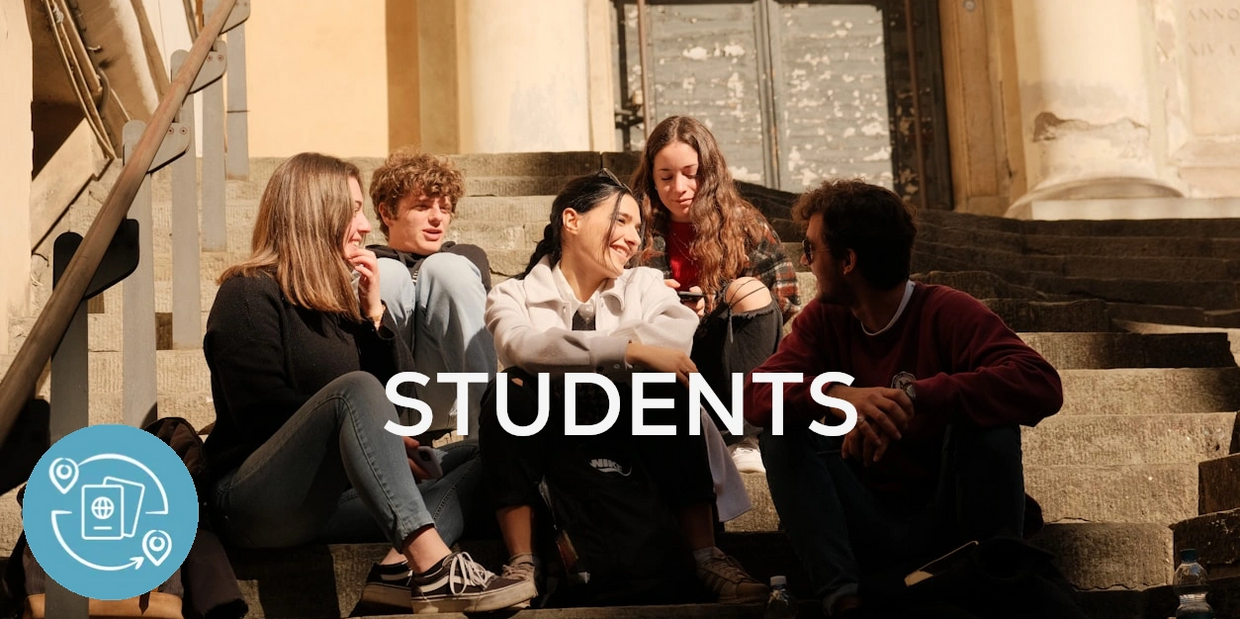 Students sitting on outdoor steps smiling and chatting with the word 'STUDENTS'