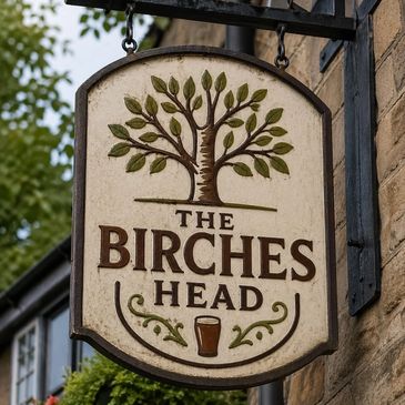Pub sign with a tree and the name 'The Birches Head'.