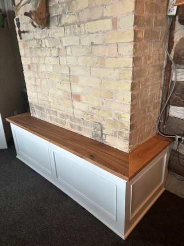 Far away view of right corner bench cabinet