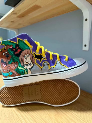 Custom Scooby-Doo themed high-top sneakers.