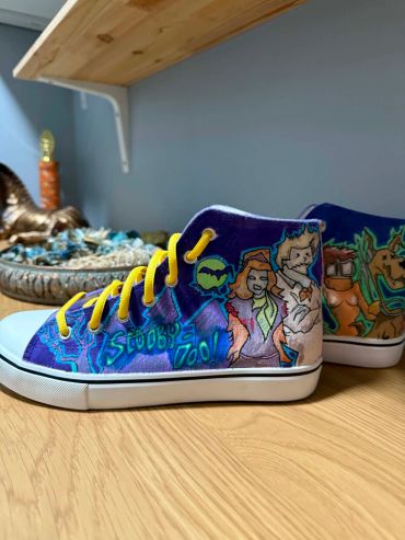 Custom Scooby-Doo themed sneakers with vibrant designs.