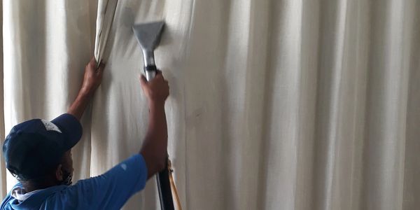 Hotel Curtain Drops on the Rail Cleaning