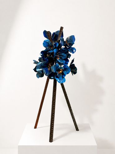 Jeff Alarie Florilège blue flower steel sculpture, contemporary botanical art with raw rebar.