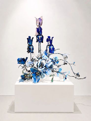 Jeff Alarie blue rose and iris steel sculpture, contemporary botanical art and floral metalwork.