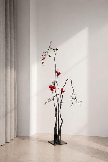 Jeff Alarie red rose steel sculpture, contemporary botanical art inspired by nature and branches.