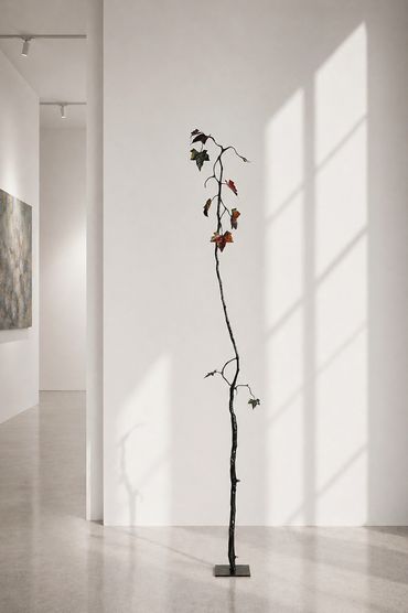 Jeff Alarie maple tree steel sculpture, contemporary nature-inspired botanical art with autumn leave