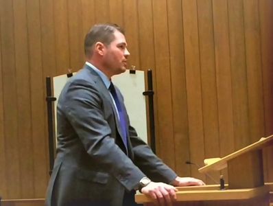 Attorney Schmidt giving an opening statement at trial.