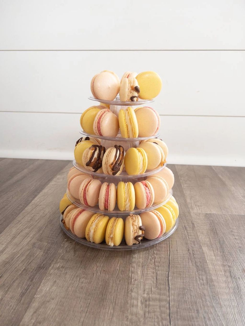 Tier of macarons perfect for special occasions. Here are salted caramel,lemon and raspberry macarons