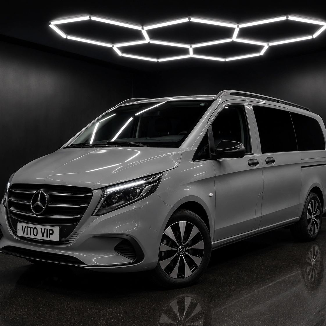 Mercedes Benz Vito VIP van in a sleek black room.