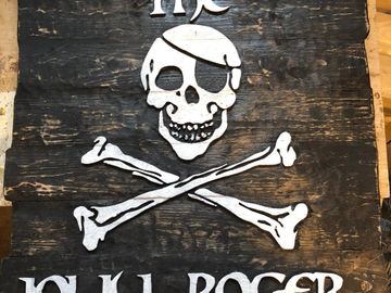 Skull and cross bones home bar sign