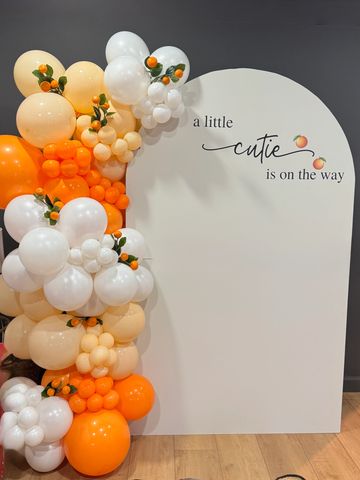 Custom signboard with coordinating balloon garland—perfect for photos, entryways, or events.