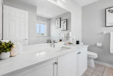 Bathroom renovation with new countertop, fixtures and painting