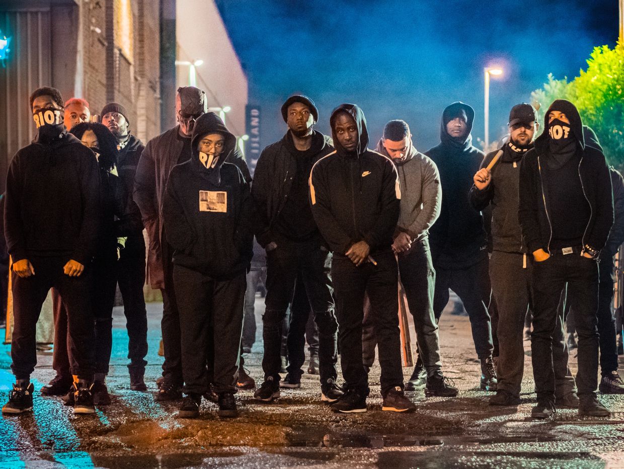 Behind the scenes group photo from Riot Music Video of men in masks by Flash Spacey Photography 