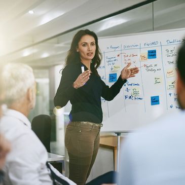 Lady performing a sales pitch.