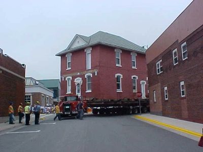 The school was moved from its original site on East Main to the village site on N 2nd Street. 