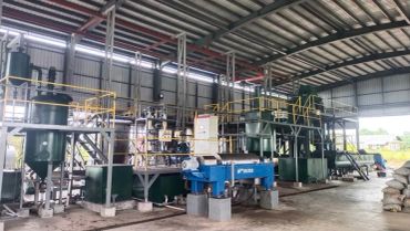 Interior of an industrial facility with machinery.