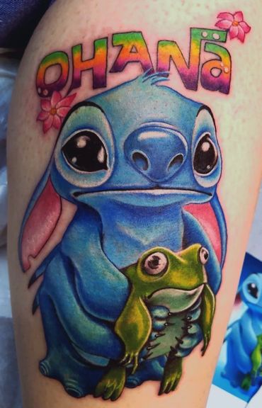 Colorful neo traditional tattoo of Stitch and a frog and Ohana Randie RaneArt