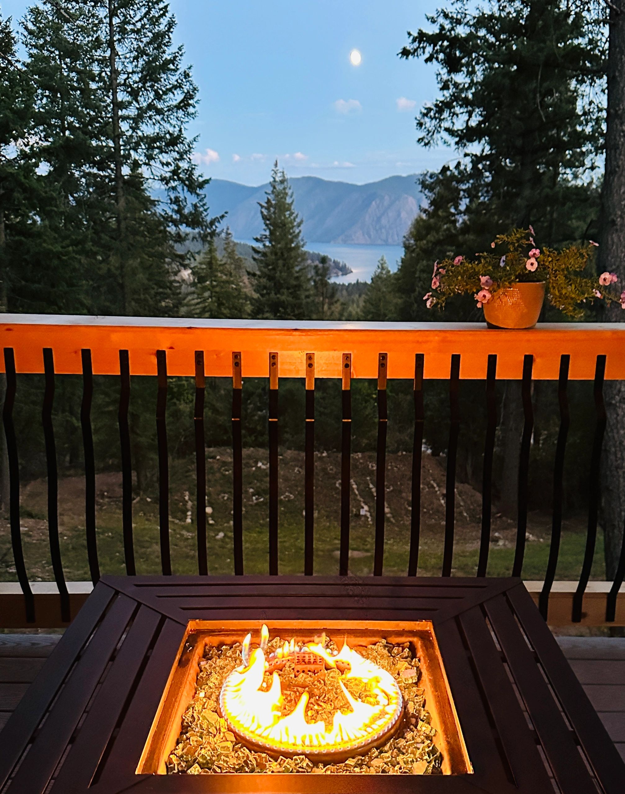 Fire table on the deck looking at Garfield Bay