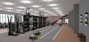 A HIIT area in a commercial fitness facility featuring TRX