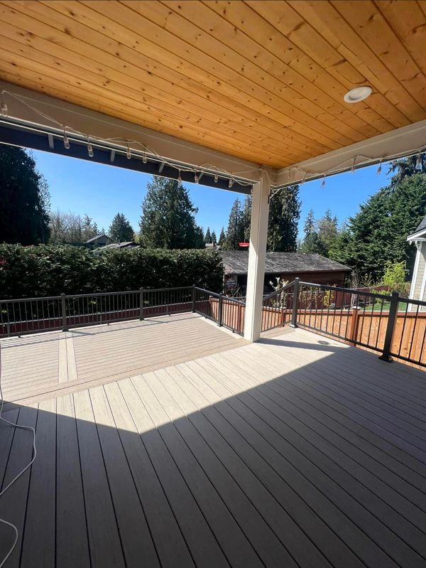 new built composite deck in back yard