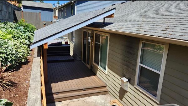 Patio cover for deck with shingle roof