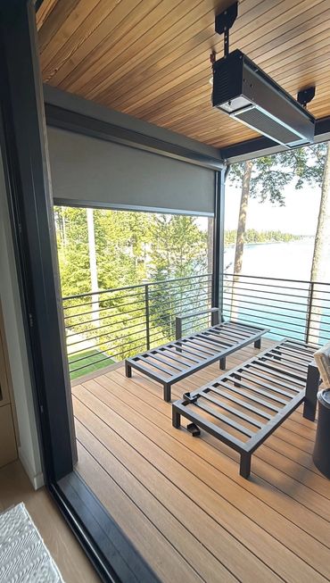 Covered Timbertech composite deck with metal railing