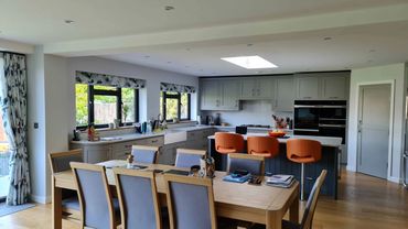 Internal view of new open plan kitchen, dining and family room after house extension in Reigate.