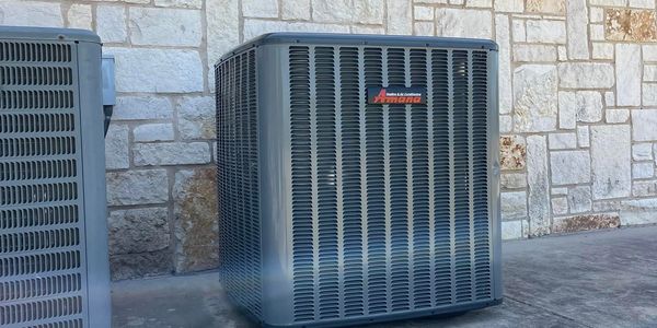 Outdoor air conditioning unit by Amana.