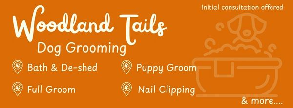 Woodland Tails dog grooming services advertisement.