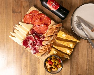 Antipesto Platter - cured meats, chorizo, Spanish torilla, olives, cheese. Ft Estrella beer.