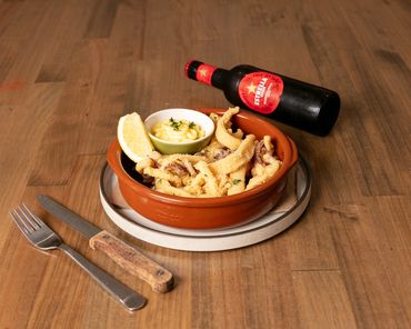 Fried Calamari - Lightly battered deep-fried calamari served with aioli. Ft Estrella beer.