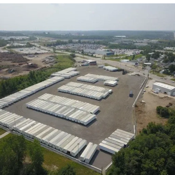 Bird's eye view of rental trailers parked in rental yard.
