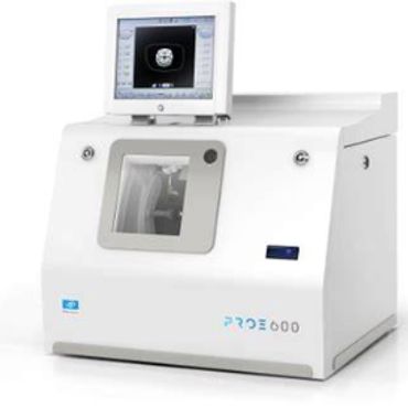 A white medical imaging machine with a monitor displaying a scan.