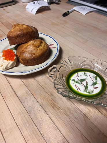 Hoecakes + fixin's ; stees butter and trout roe , creole cream cheese and allium