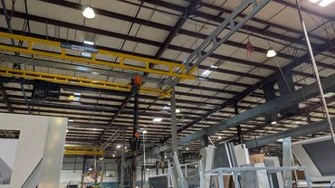 Industrial warehouse with overhead crane system.