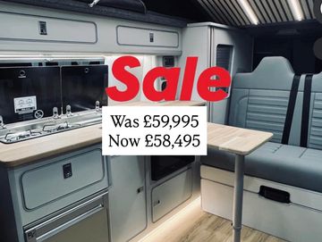 Interior of a campervan with sale price overlay.