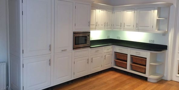 skilled carpenter designs & fits cupboards, bookshelves and bespoke made to fit furniture