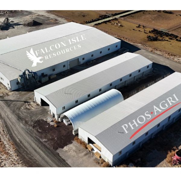 Aerial view of industrial buildings with Falcon Isle Resources and PhosAgri logos on roofs.