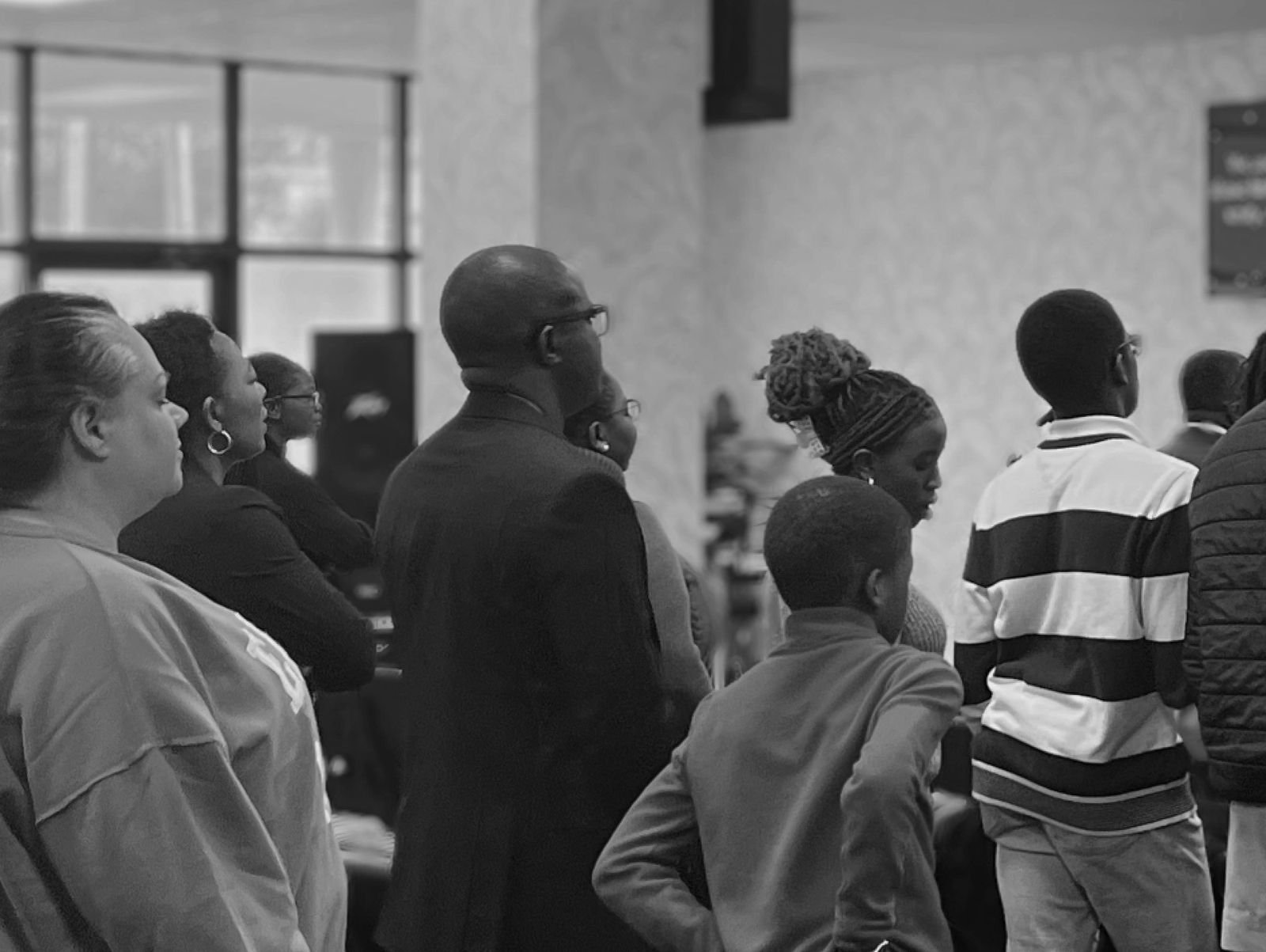 TRP Members Praying together in church