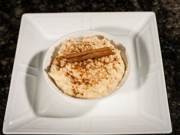 Creamy rice pudding with milk, sugar and cinnamon.
