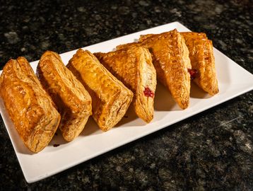 Flaky Cuban pastries filled with guava, cheese or sweet cream.