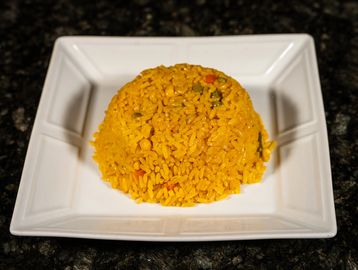 Seasoned yellow rice cooked with Cuban spices for a rich color and savory flavor.