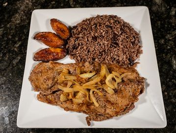 Grilled beef steak marinated with garlic and spices, juicy, tender, and full of flavor.