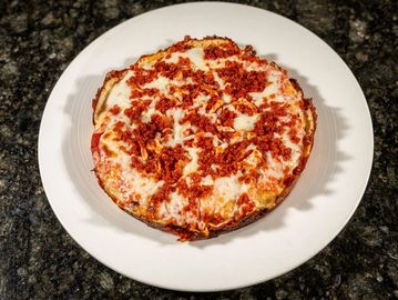 Cuban-style pizza with tomato sauce, mozzarella and flavorful chorizo.