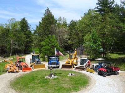 Backhoe loader work, brush and wood chipping, trucking, skidsteer work, and site work.