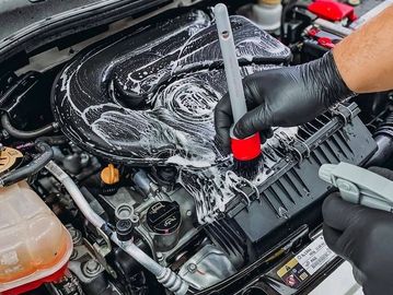 Professional engine bay deep cleaning and detailing for a clean, refreshed finish.