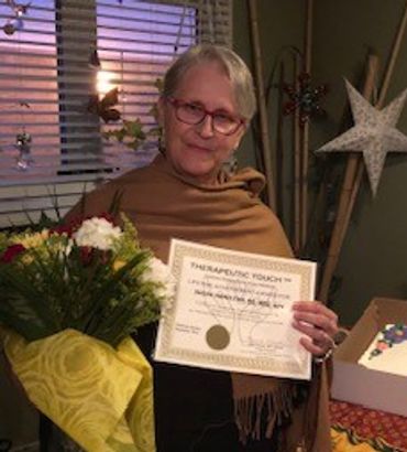 Susan Hamilton Receiving A Diploma