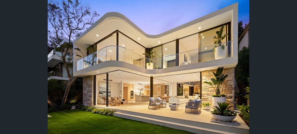 The paintwork is flawless, smooth, and crisp—elevating the home's elegant, modern architectural style.