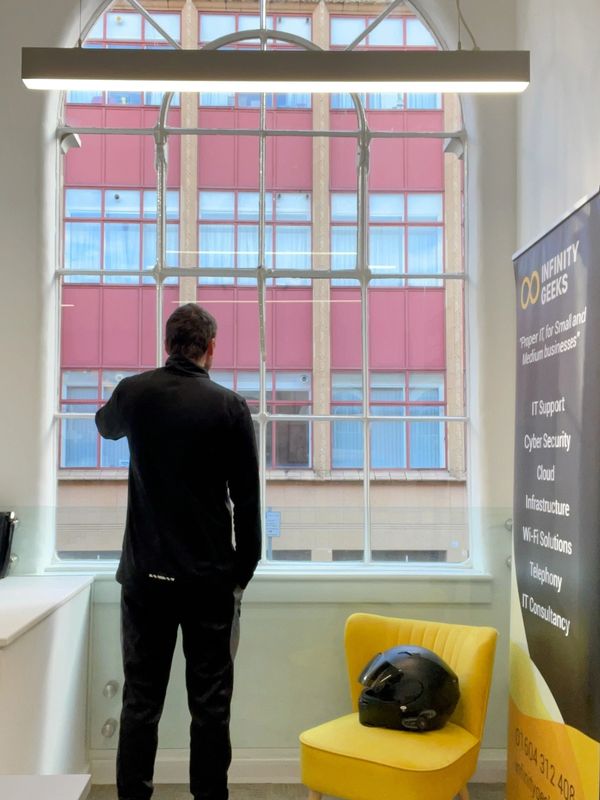Infinity Geeks — team member overlooking Northampton